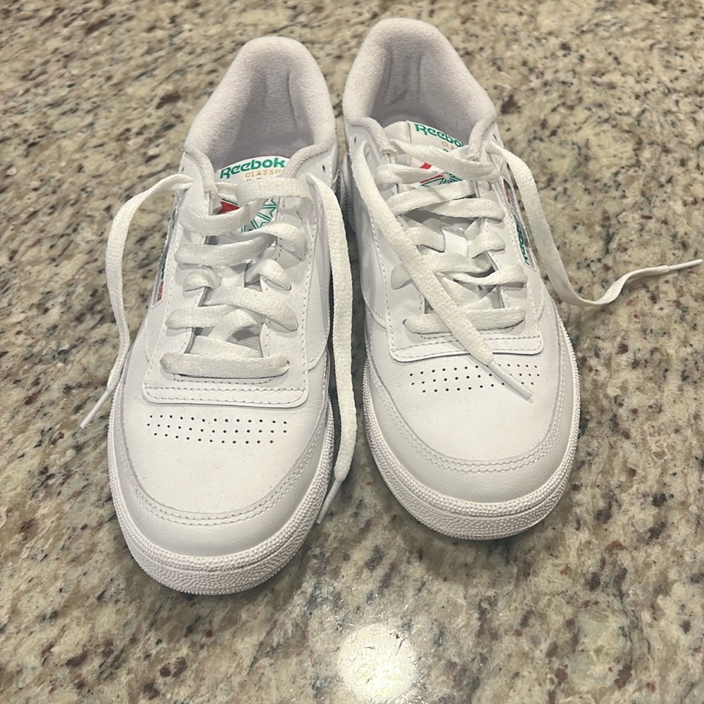 Brand new Reeboks. Classic style. Size 9